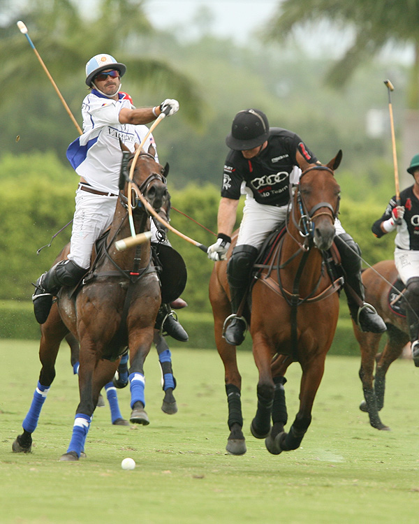 Valiente 10-goaler Adolfo Cambiaso hooks Audi team captain Marc Ganzi who re-injured his broken thumb on his mallet hand and was forced to leave the game in the fifth chukker